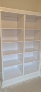 gloss painted clean shelves in a cupboard