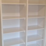 gloss painted clean shelves in a cupboard