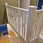 freshly painted wooden banisters and walls