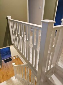 freshly painted wooden banisters and walls