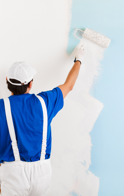 workman painting with a roller